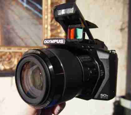 Olympus SP-100 Eagle Eyes - we shoot images with a Red Dot gunsight